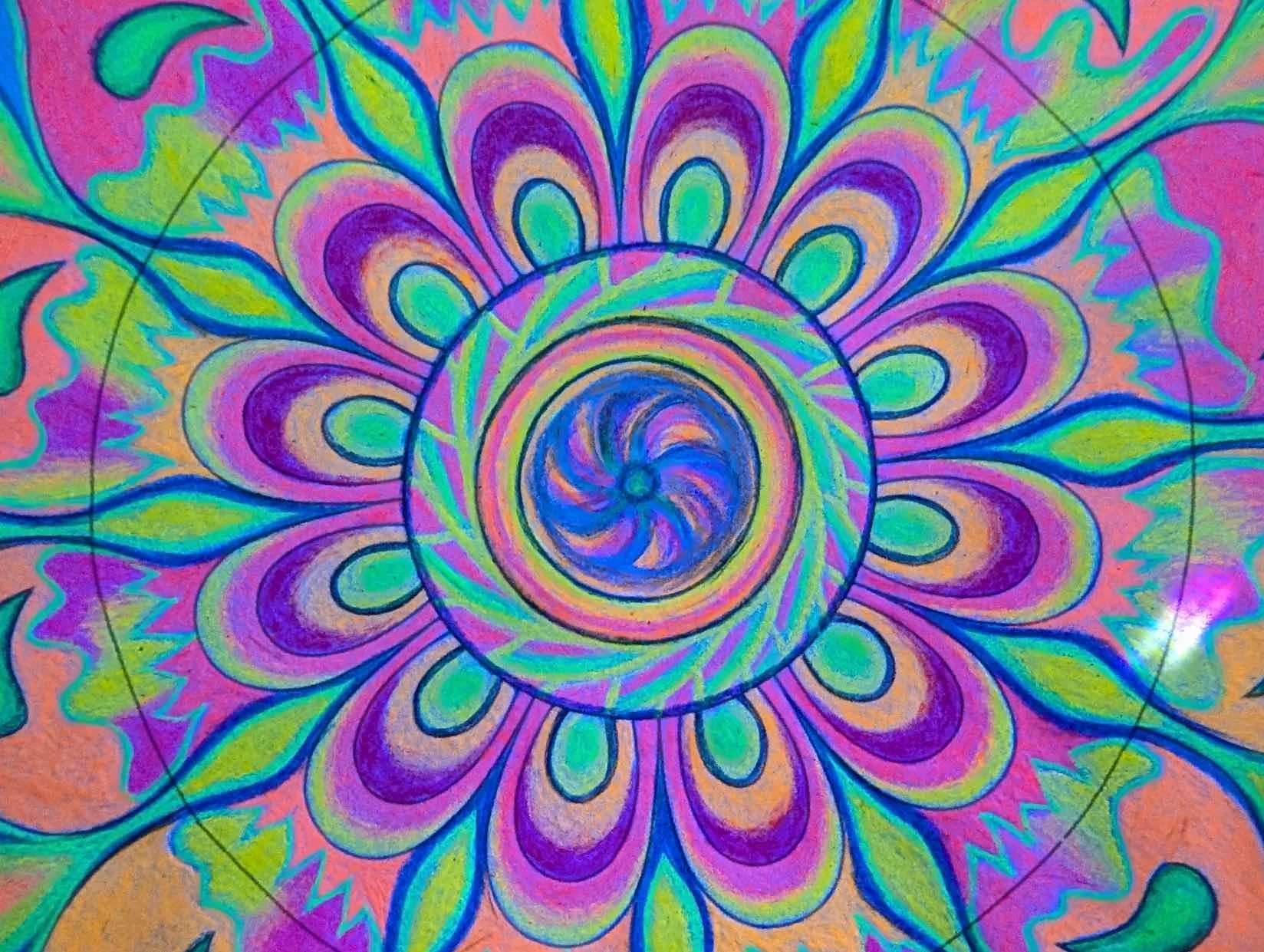 Colorful mandala with swirling patterns and floral motifs in shades of purple, blue, green, pink, and orange.