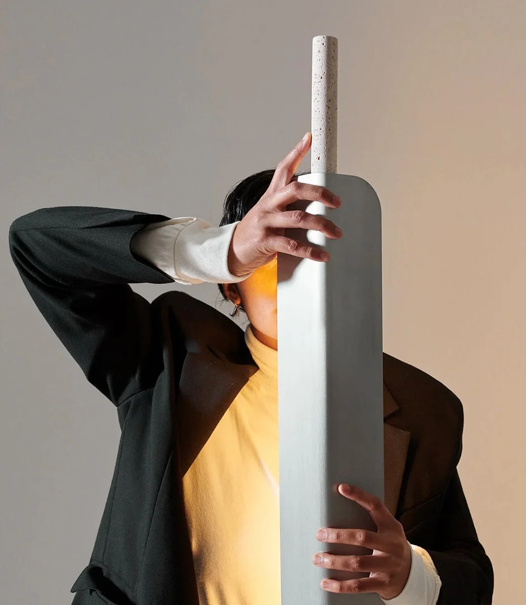 designer holding a light