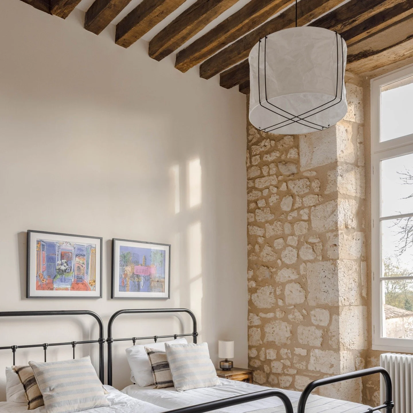 I love this cute twin room which can be made up as a twin or a double. With its own en-suite with beautiful Morrocon handmade Zellige tiles, wooden beams and beautiful old stone walls, it's the perfect place to curl up with a book and relax.