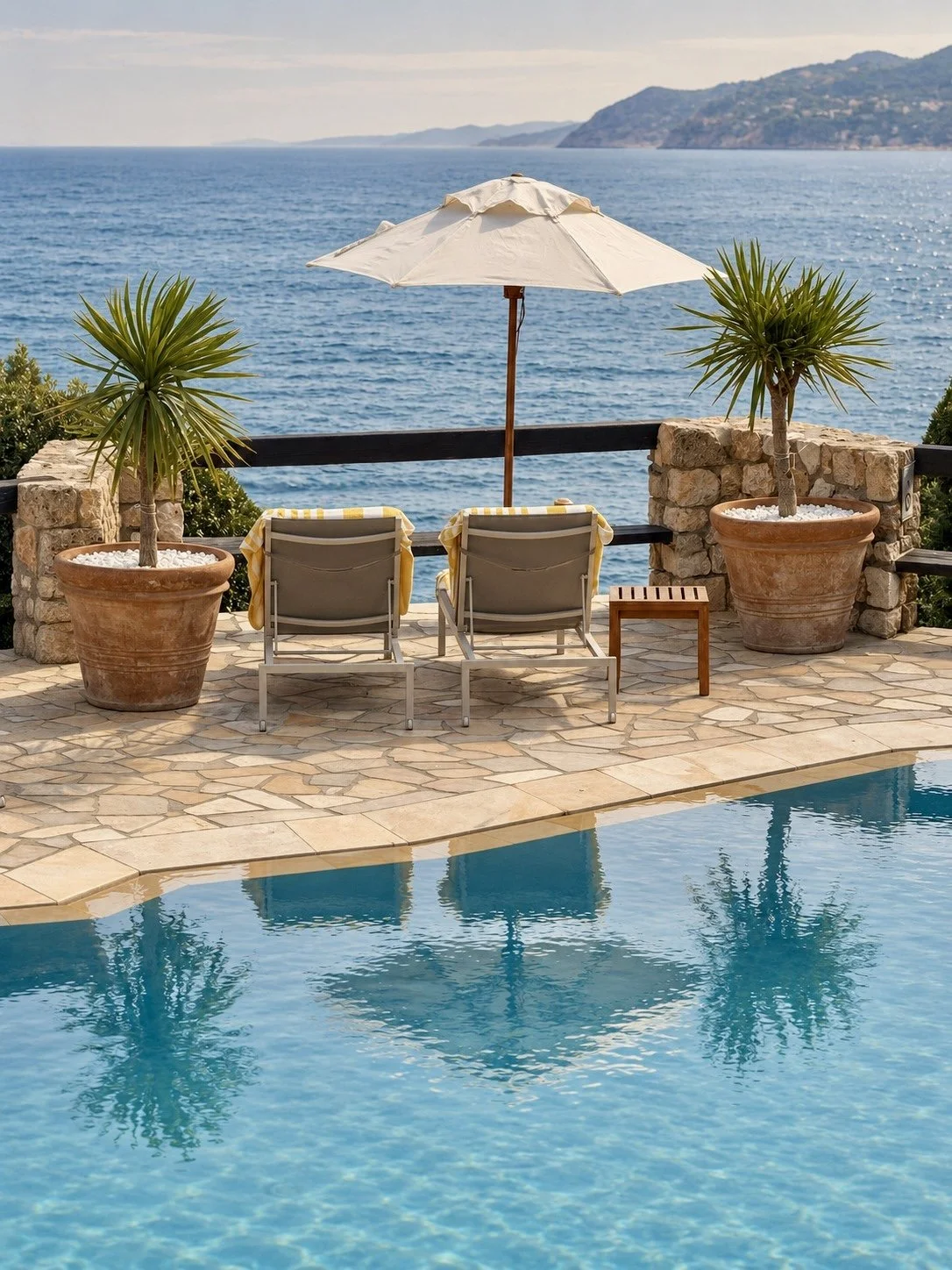 Il-Pellicano-pool-sun-chairs-sea-view.jpg