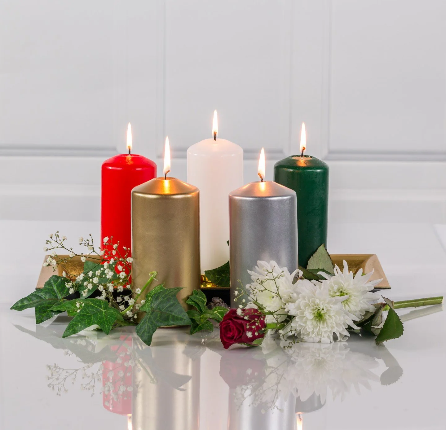 This Christmas, transform your table into a stunning festive masterpiece with our luxurious Pillar Candle range. Available in rich Red, Gold, Silver, and Green, these candles are the perfect addition to your holiday centerpiece, creating a warm and i