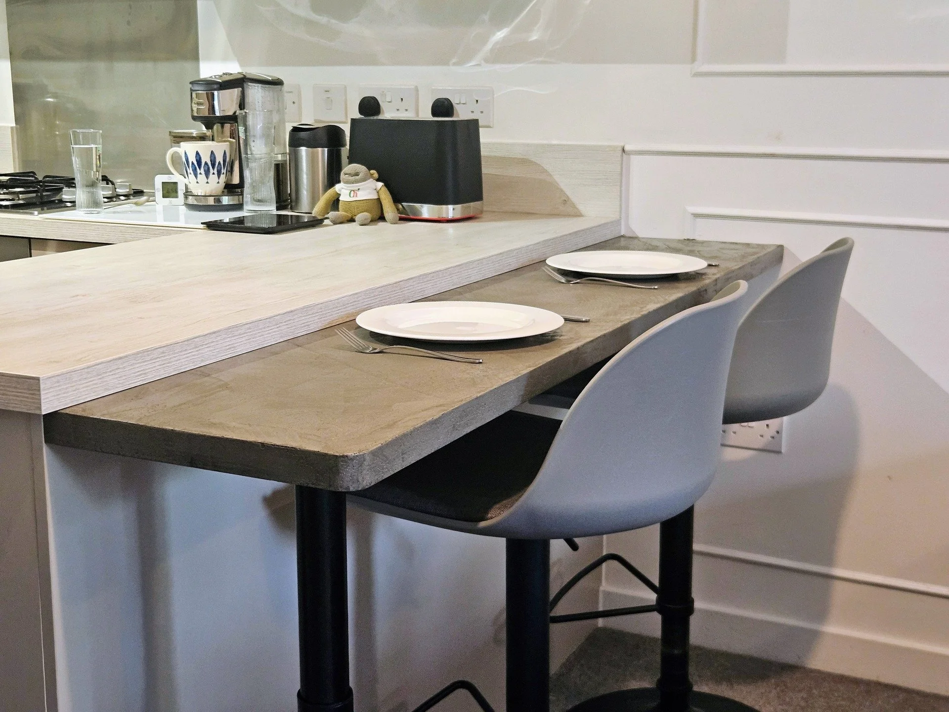 Custom microcement breakfast bar &mdash; mid grey, sealed, waxed, and buffed to a soft sheen.

Rich textures, natural patterns, and a smart space-saving design for a client with no room for a table.
Practical doesn&rsquo;t have to be boring.

#microc