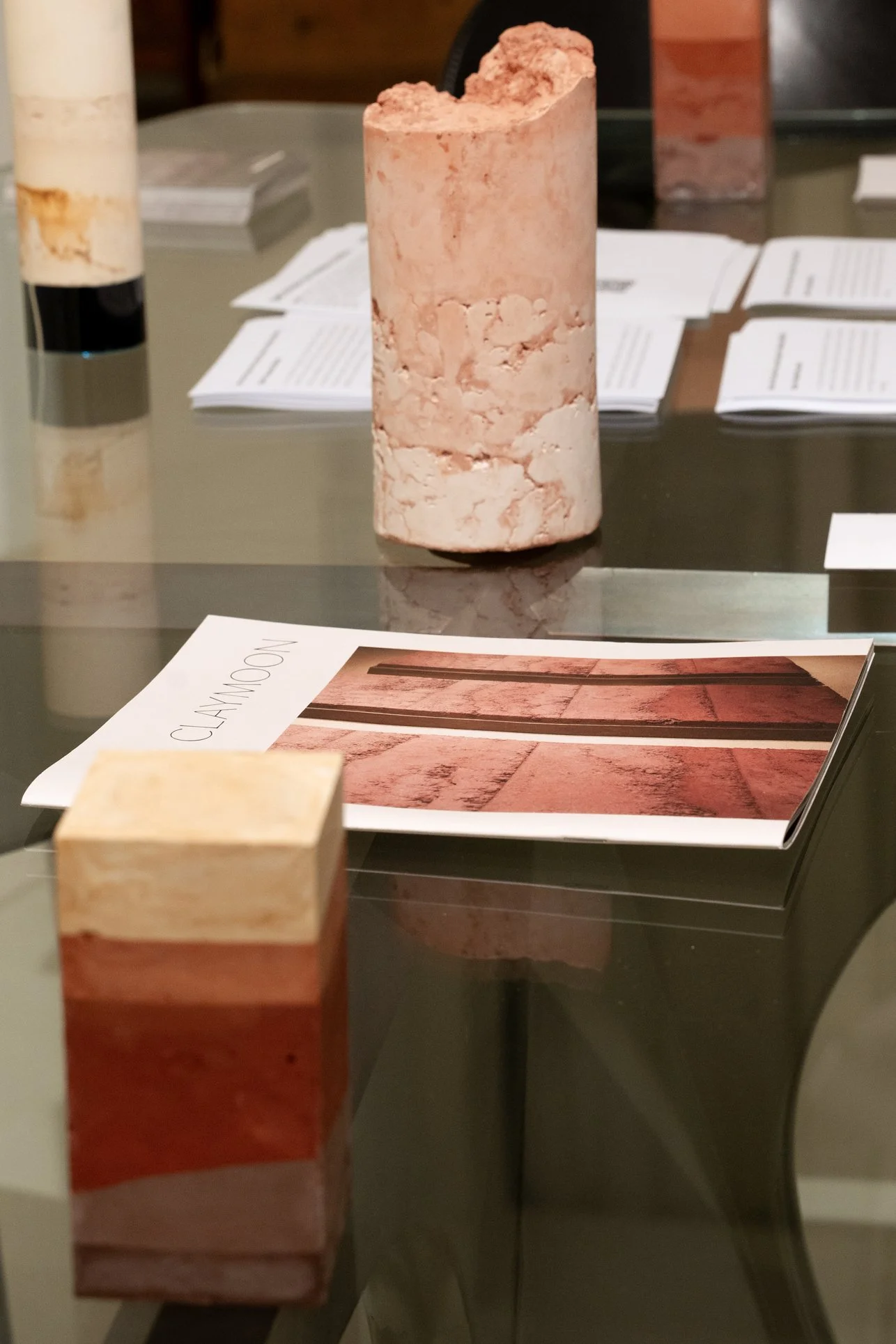 Adam Weissman art brochure on a first-edition Alada table by Oscar Tusquets at Matiz Gallery, Barcelona.