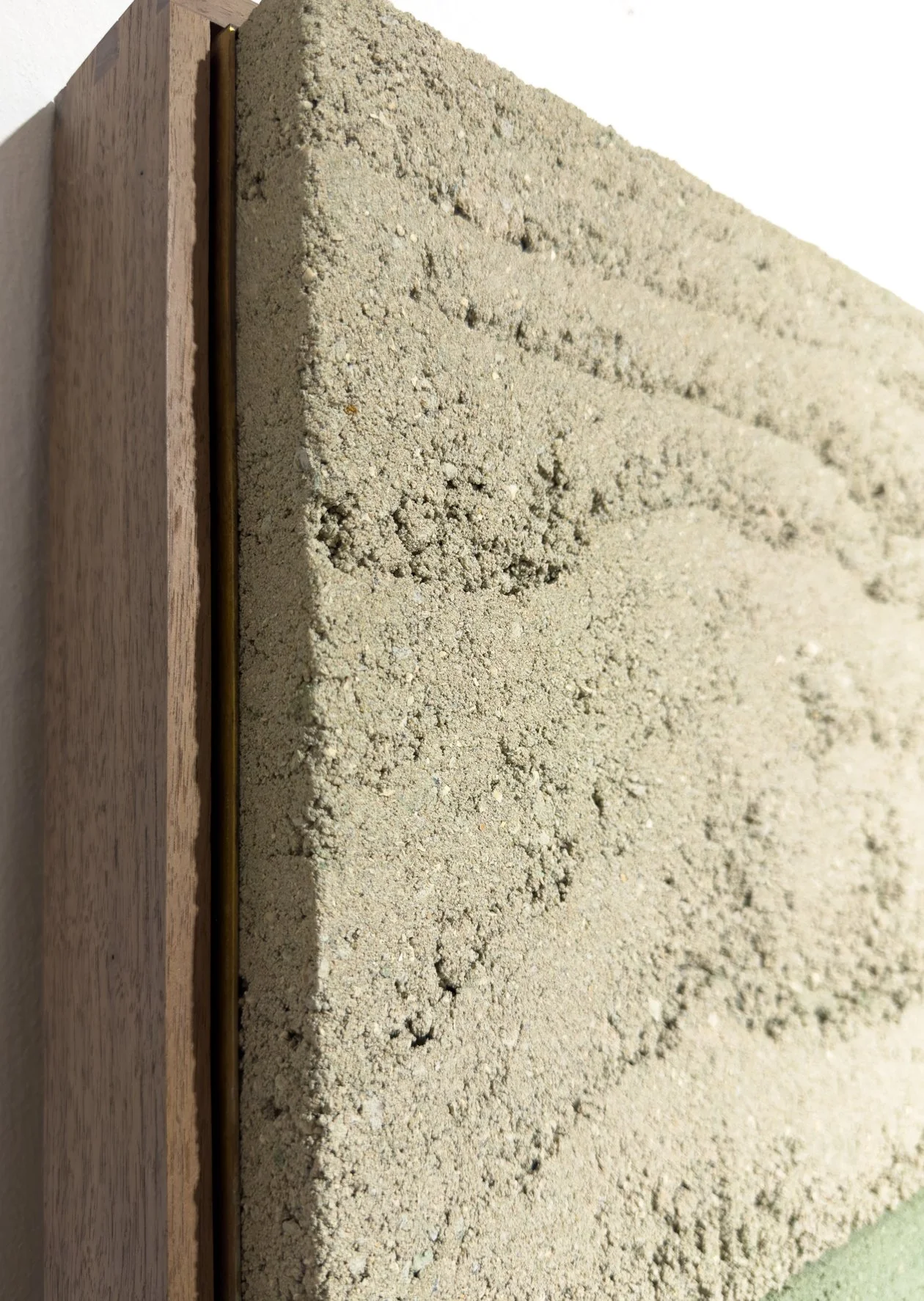 Side view of CM009 – Green Rammed Earth Series revealing material depth and unfired clay construction by Adam Weismann (Claymoon)