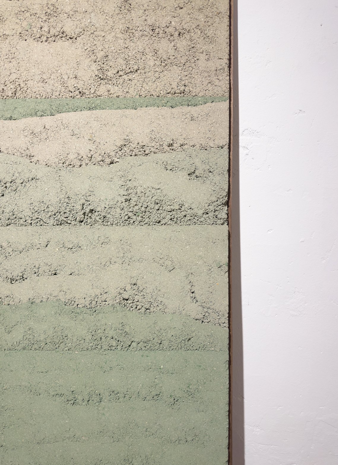 Detail of CM009 – Green Rammed Earth Series showing layered unfired clay texture and compressed strata by Adam Weismann (Claymoon)
