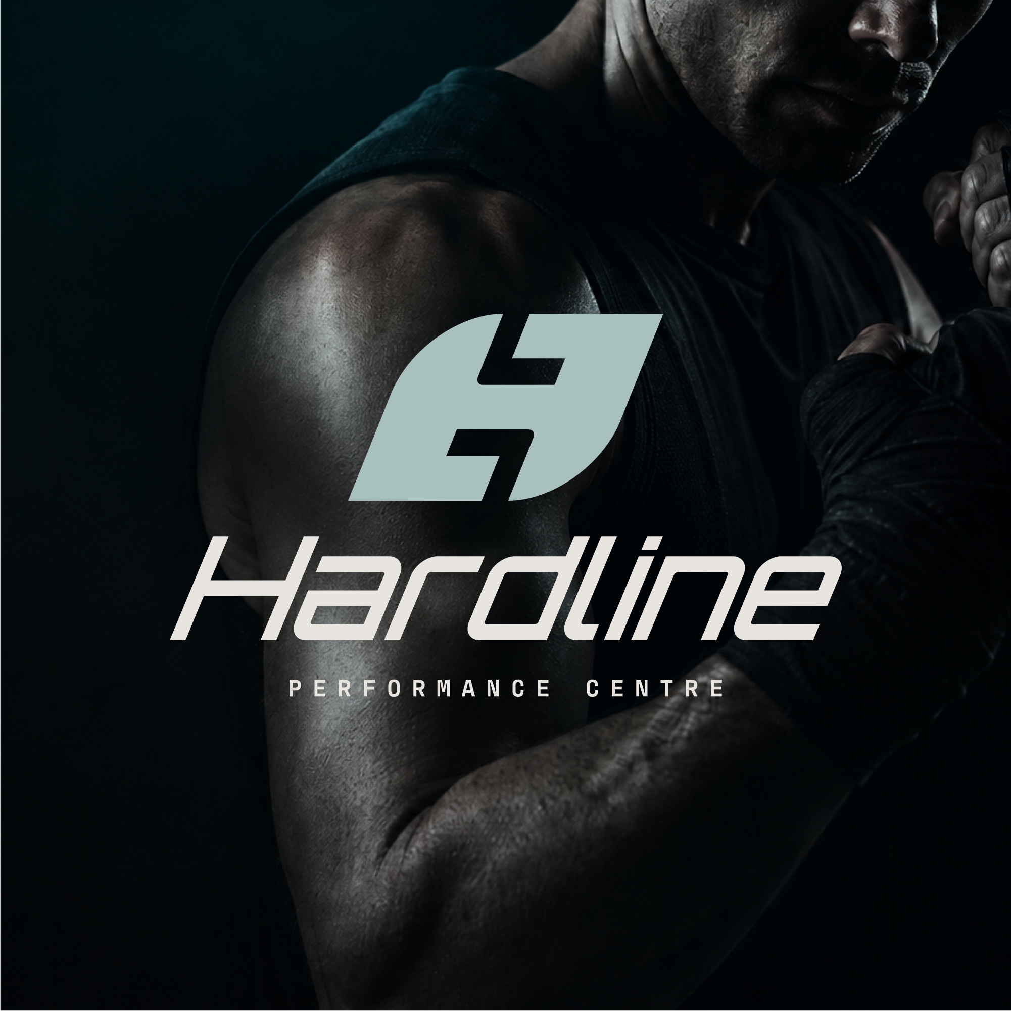 Close-up of a man in athletic clothing showing muscular shoulders and neck, with a logo for 'Athlete Performance Centre' overlaying the image.