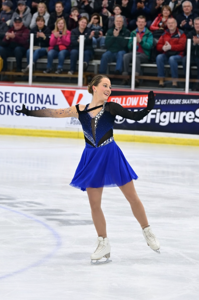 Adult skater performing at an ice skating competition as part of the US Figure Skating Adult Championships