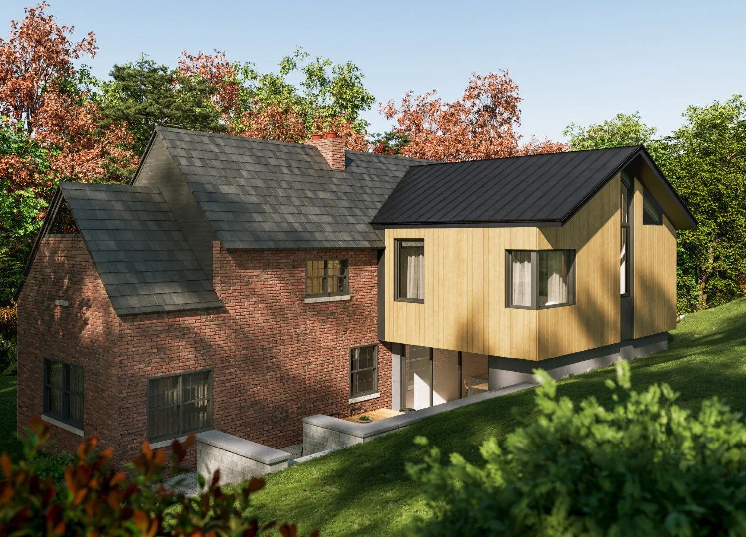 A modern house with brick and wooden exterior, black metal roof, surrounded by lush greenery and trees.