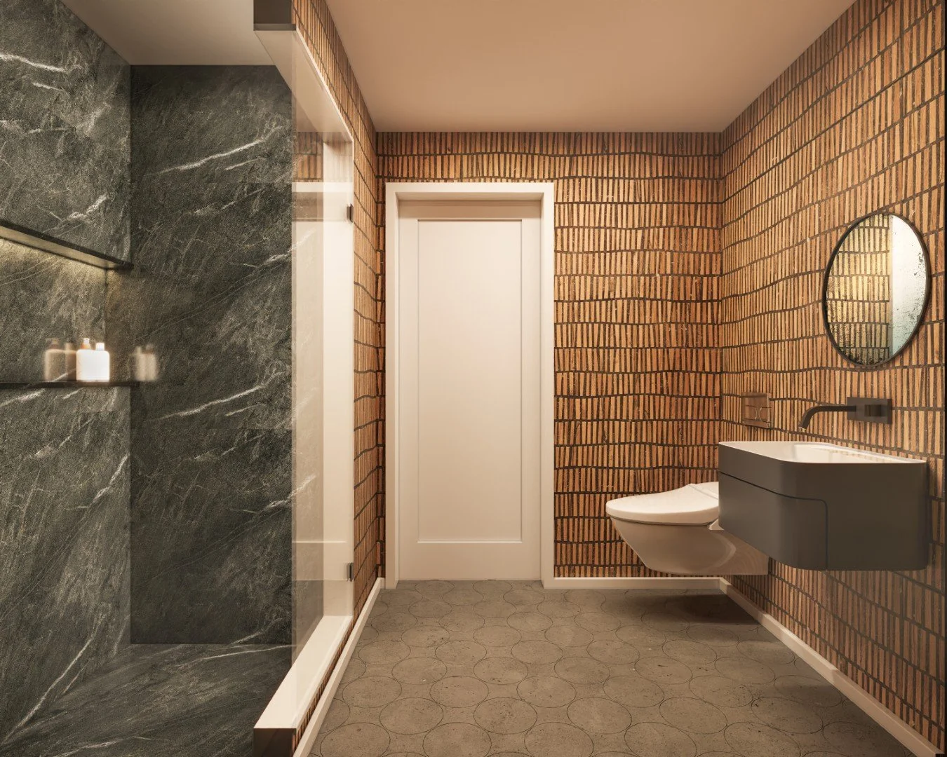 Modern bathroom with brick wall, gray floating sink, round mirror, toilet, and marble shower wall.