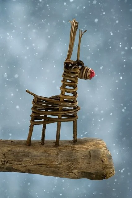 reindeer snowy background.jpeg
