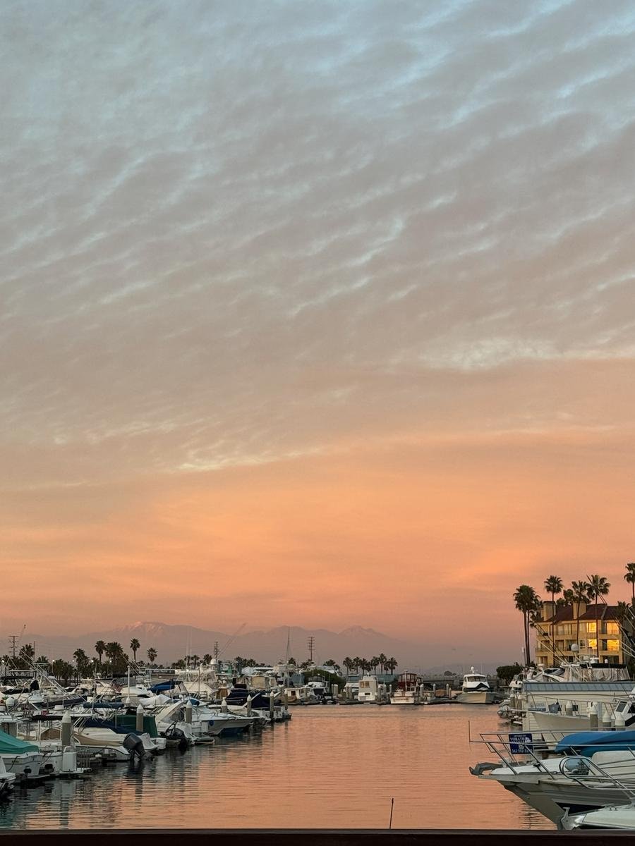 Sunset over Huntington Harbour marina near House of Chiropractic in Huntington Beach