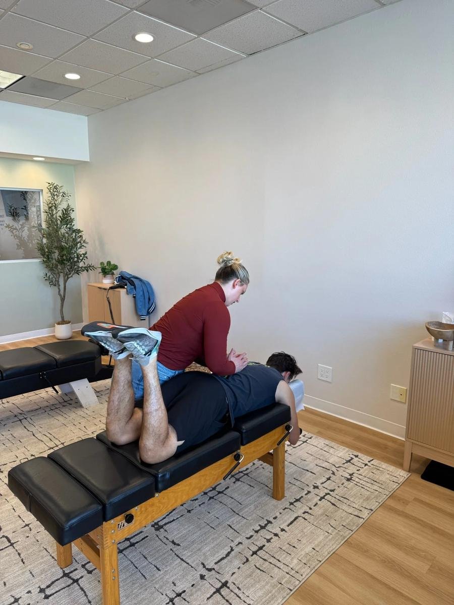 Chiropractor adjusting a patient for anxiety and stress relief in Huntington Beach