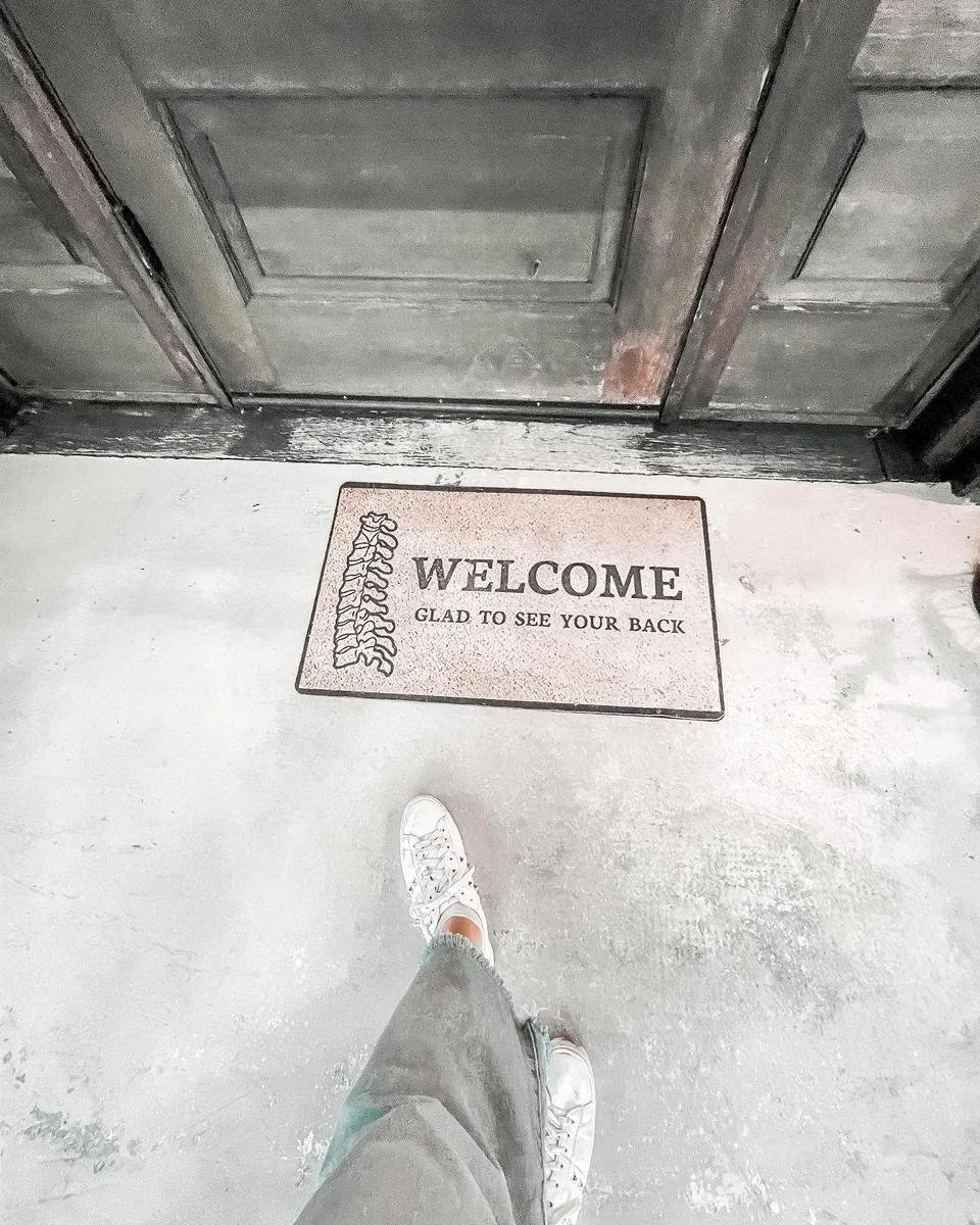 House of Chiropractic welcome mat at the office entrance near Seal Beach