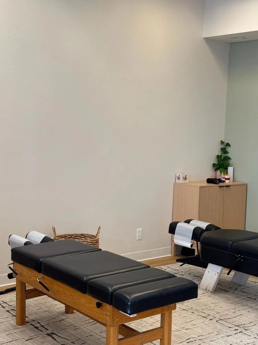 Chiropractic adjustment tables in the treatment room serving Costa Mesa patients