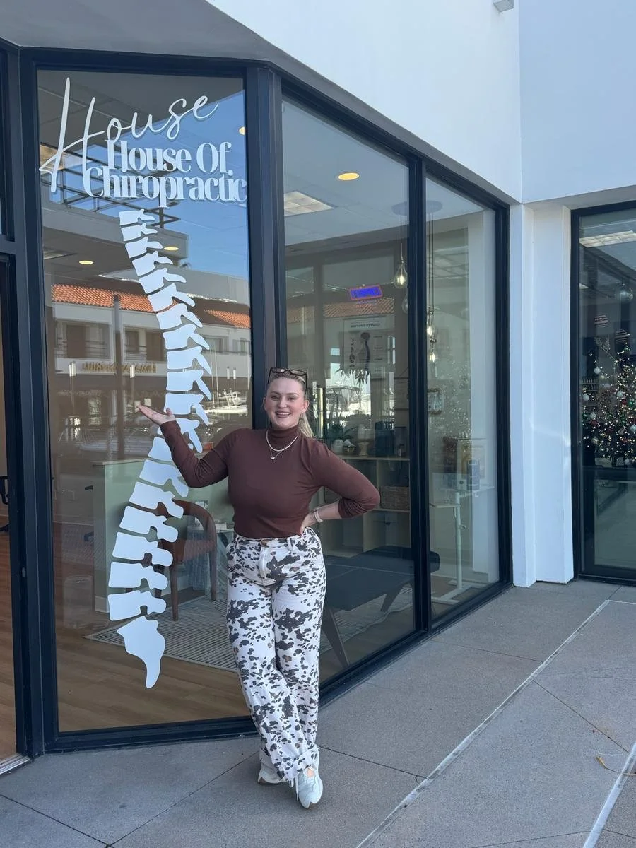 Dr. Corrin Harris outside House of Chiropractic in Huntington Beach