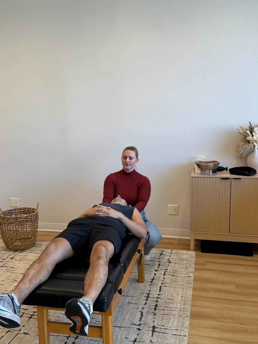 Chiropractor performing a cervical adjustment to relieve neck pain