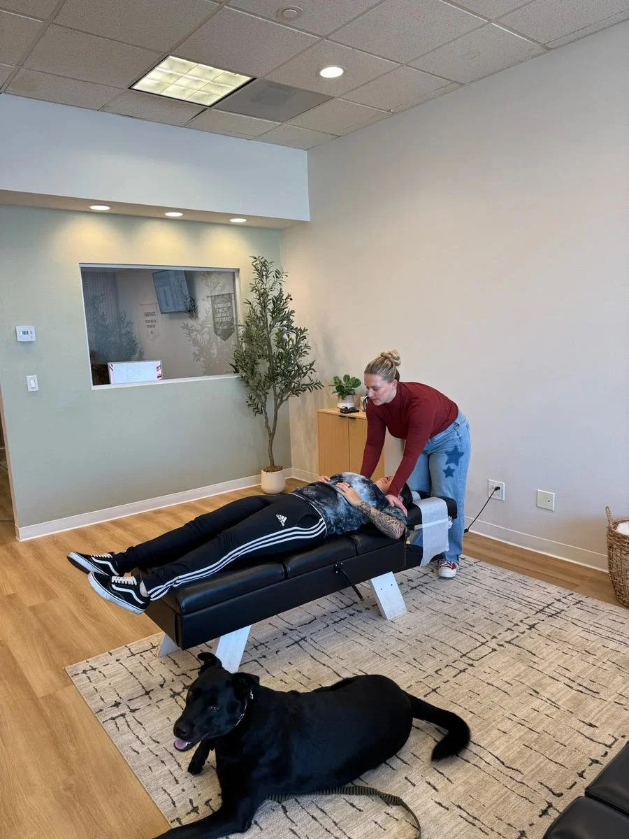 Chiropractor adjusting a patient for headache and migraine relief in Huntington Beach