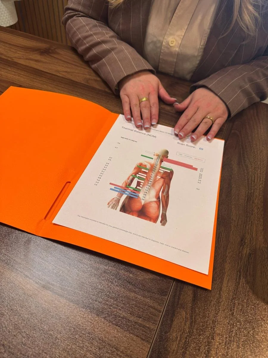 Reviewing a spinal nerve report during a new patient first visit