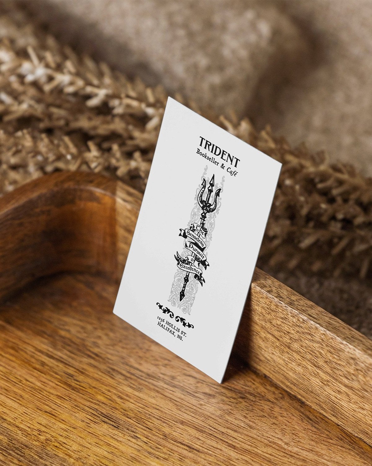 Vertical+Business+Card+with+Plant+Mockup.jpg