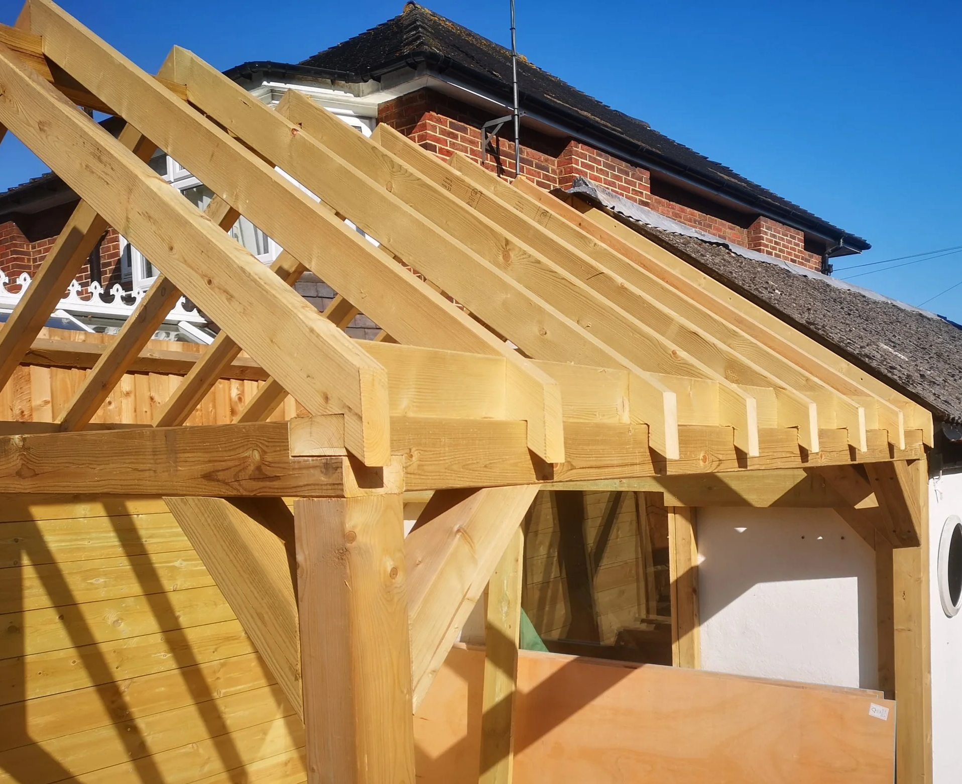 Gazebo post and beam, rafter open gable roof joinery in Riddlesdown