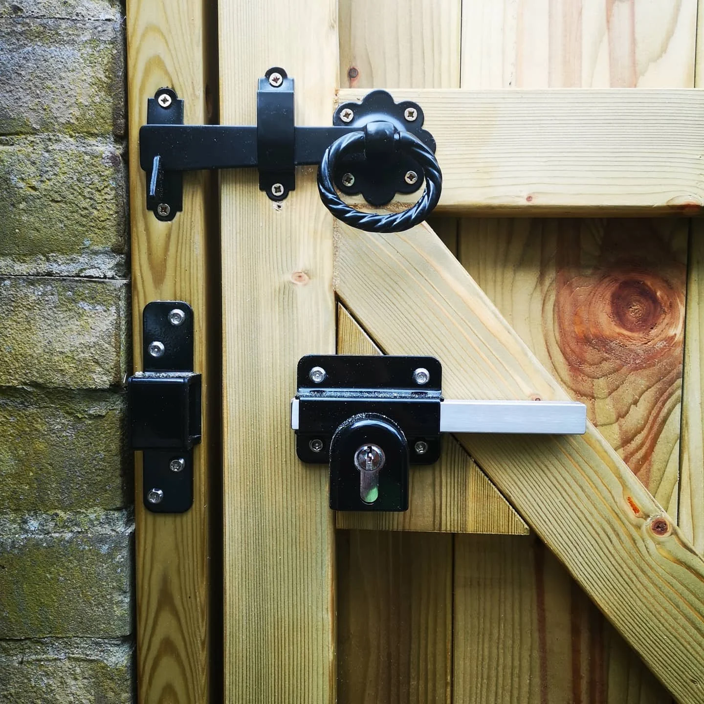 Timber security gate with outdoor keyed lock in Caterham