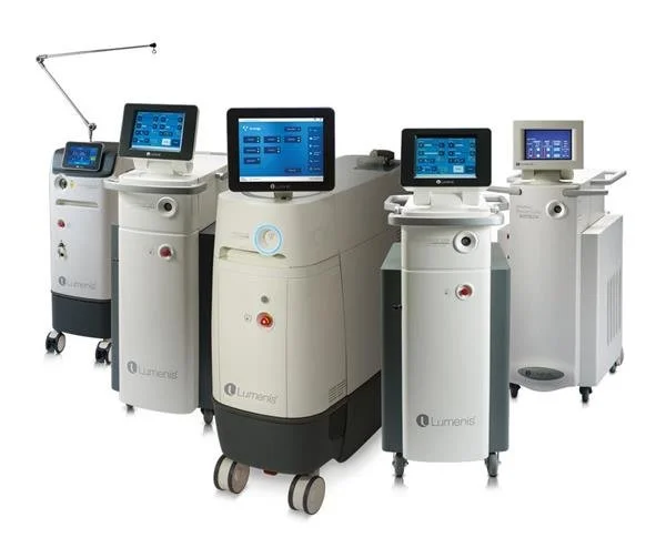 Collection of five medical laser machines with digital screens and controls, used for dermatology or cosmetic procedures.