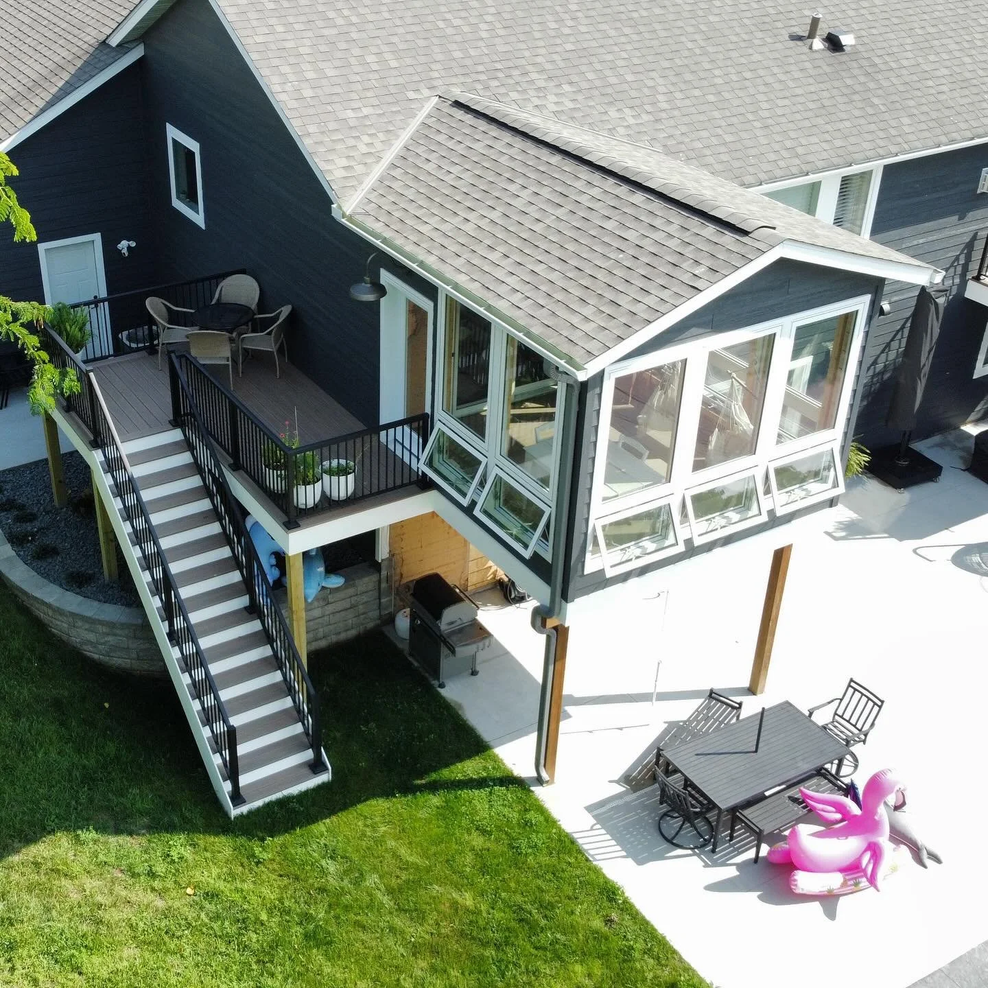 Project from this Spring! We got the chance to add on a great sun room to this clients house, a deck off the side, and steps down to the pool! In addition to that, we also got to build a beautiful deck off of the master bedroom, a ramp, and a platfor