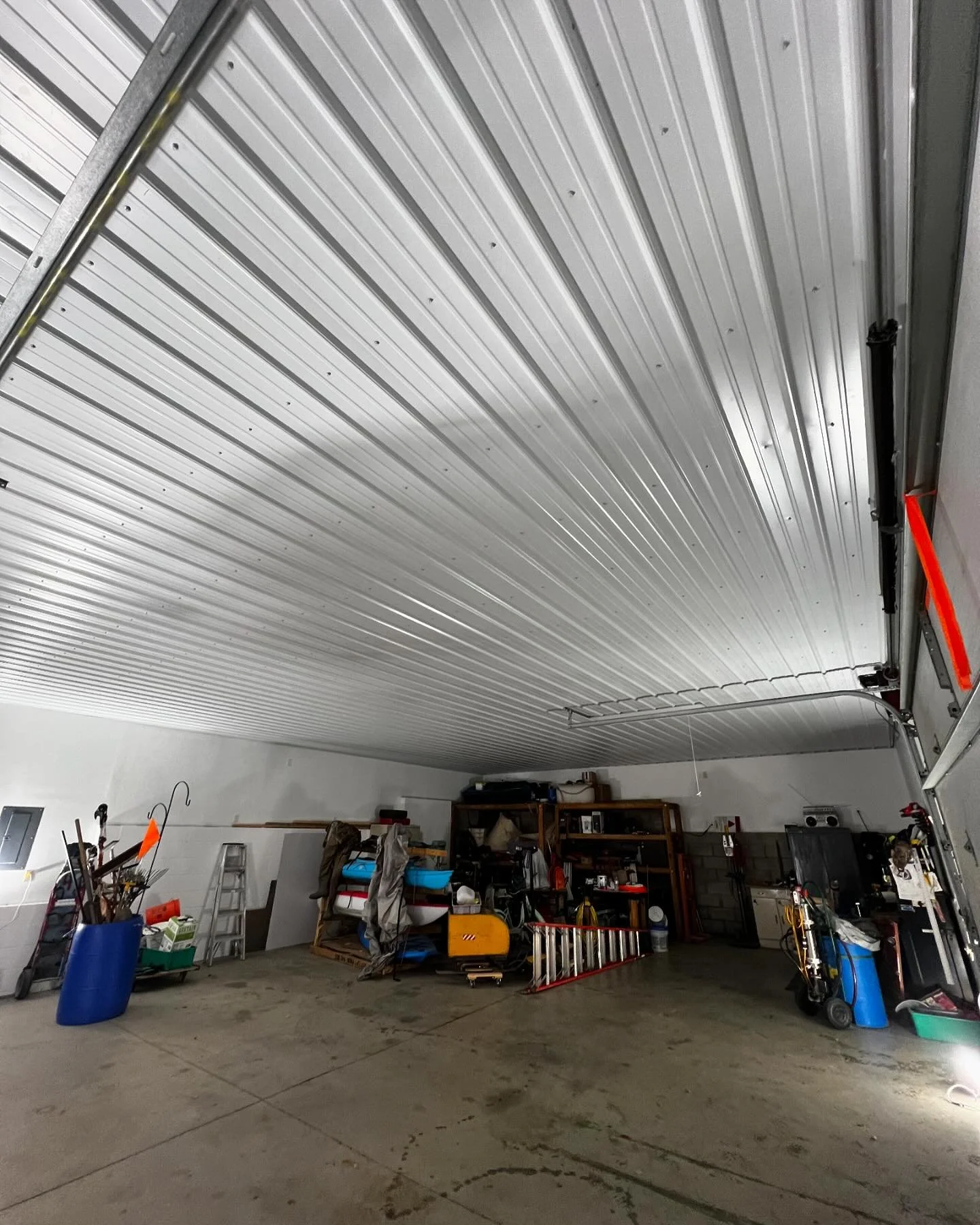 This garage got a bright new update! We installed a new tin ceiling for this client to really finish off their garage and give it a whole new feeling!  Give us a call today for any project that you&rsquo;ve got in mind and we can make it happen!