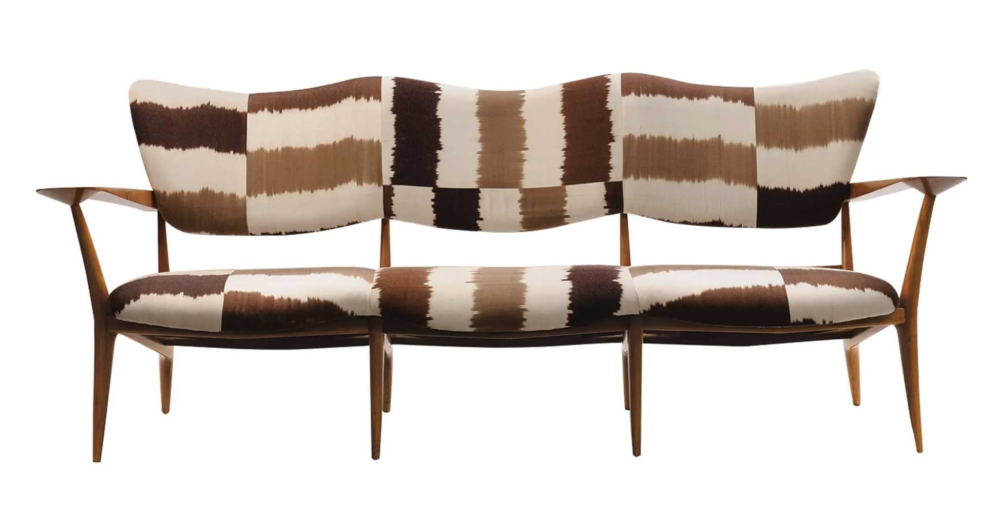 “I had a show where I covered midcentury furniture in my fabrics. I love this Ico & Luisa Parisi settee covered in my dune stripe fabric.”

Courtesy of Madeline Weinrib
