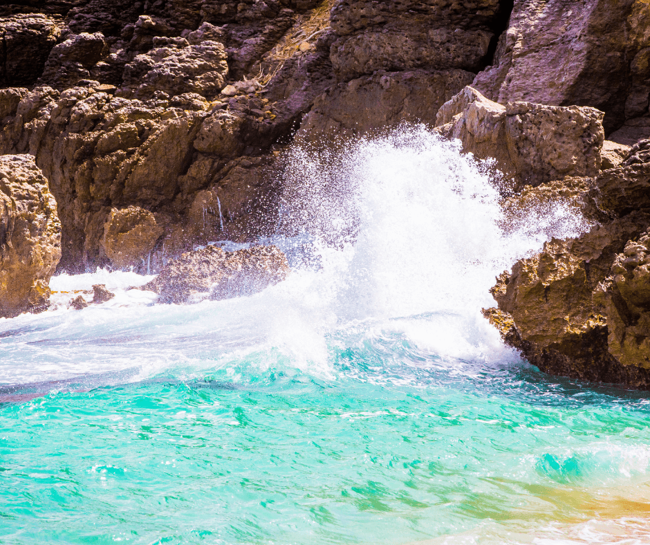 crystal clear water crashing on st barths island