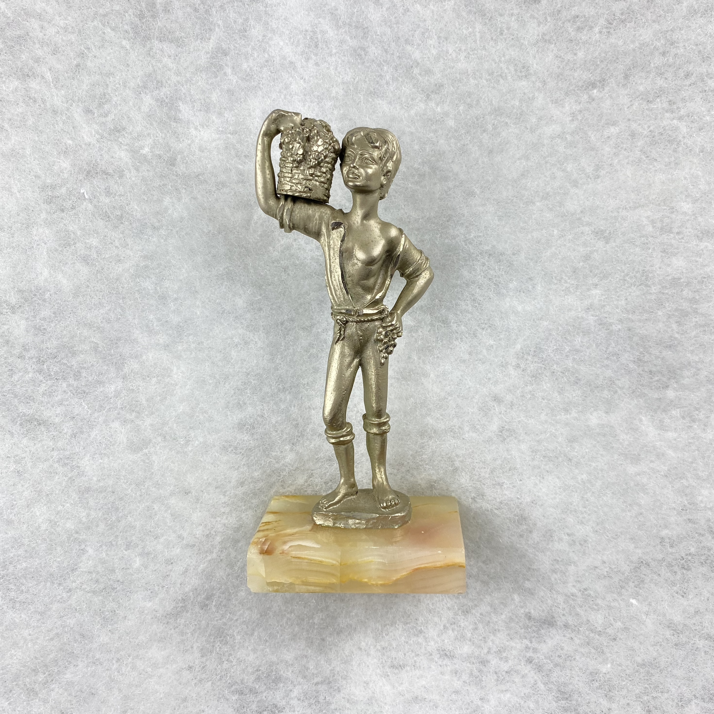   GAY object 055  Pewter fruit seller boy ornament with onyx base 