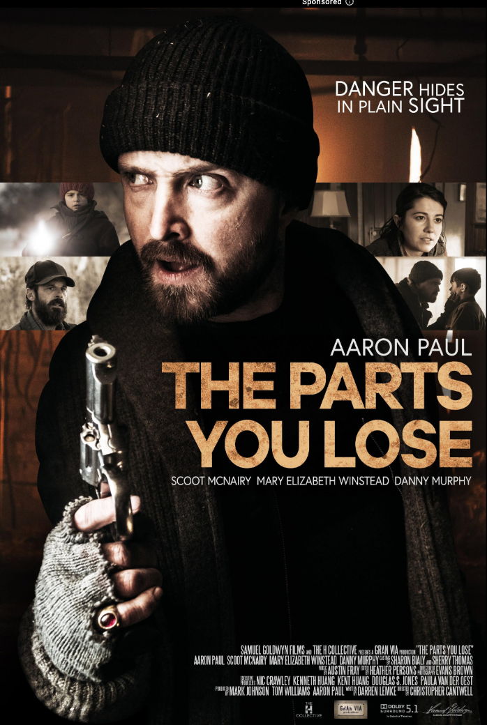 A man with a beard and beanie holding a gun in the foreground, with a collage of other scenes and people in the background from the movie 'The Parts You Lose'.
