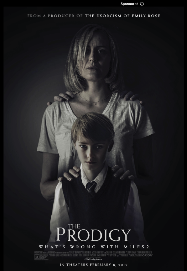 Movie poster for 'The Prodigy' showing a woman with a serious expression standing behind a boy with a stern look, both in grayscale.