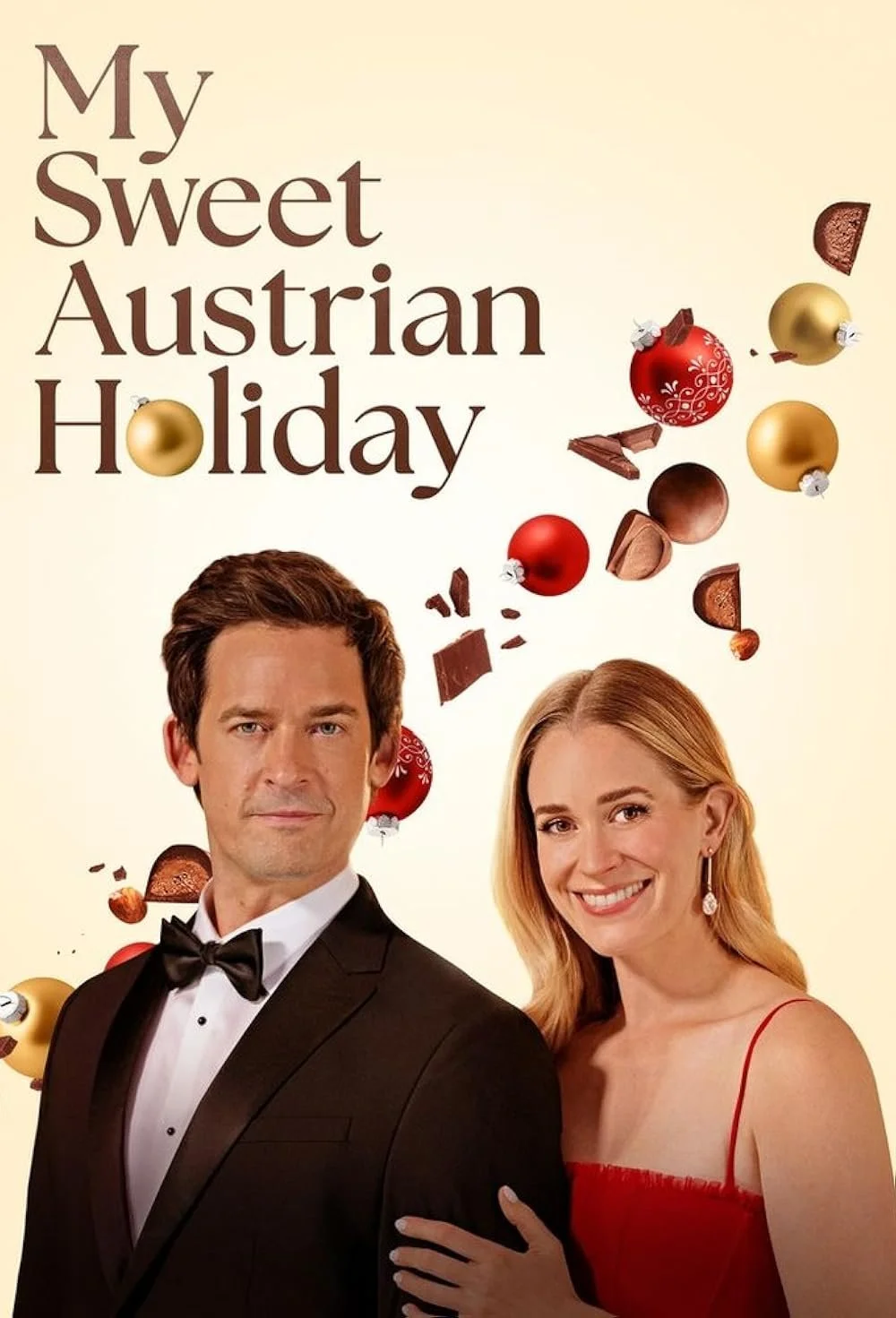 Promotional poster for the movie 'My Sweet Austrian Holiday' featuring a man in a tuxedo and a woman in a red dress, with decorative Christmas ornaments and chocolates around them.