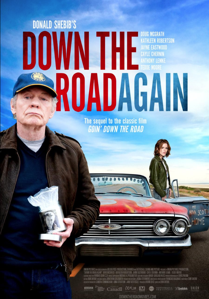 Movie poster for 'Down the Road Again' featuring an elderly man holding a photo, a young woman, and a classic car on a rural road background.