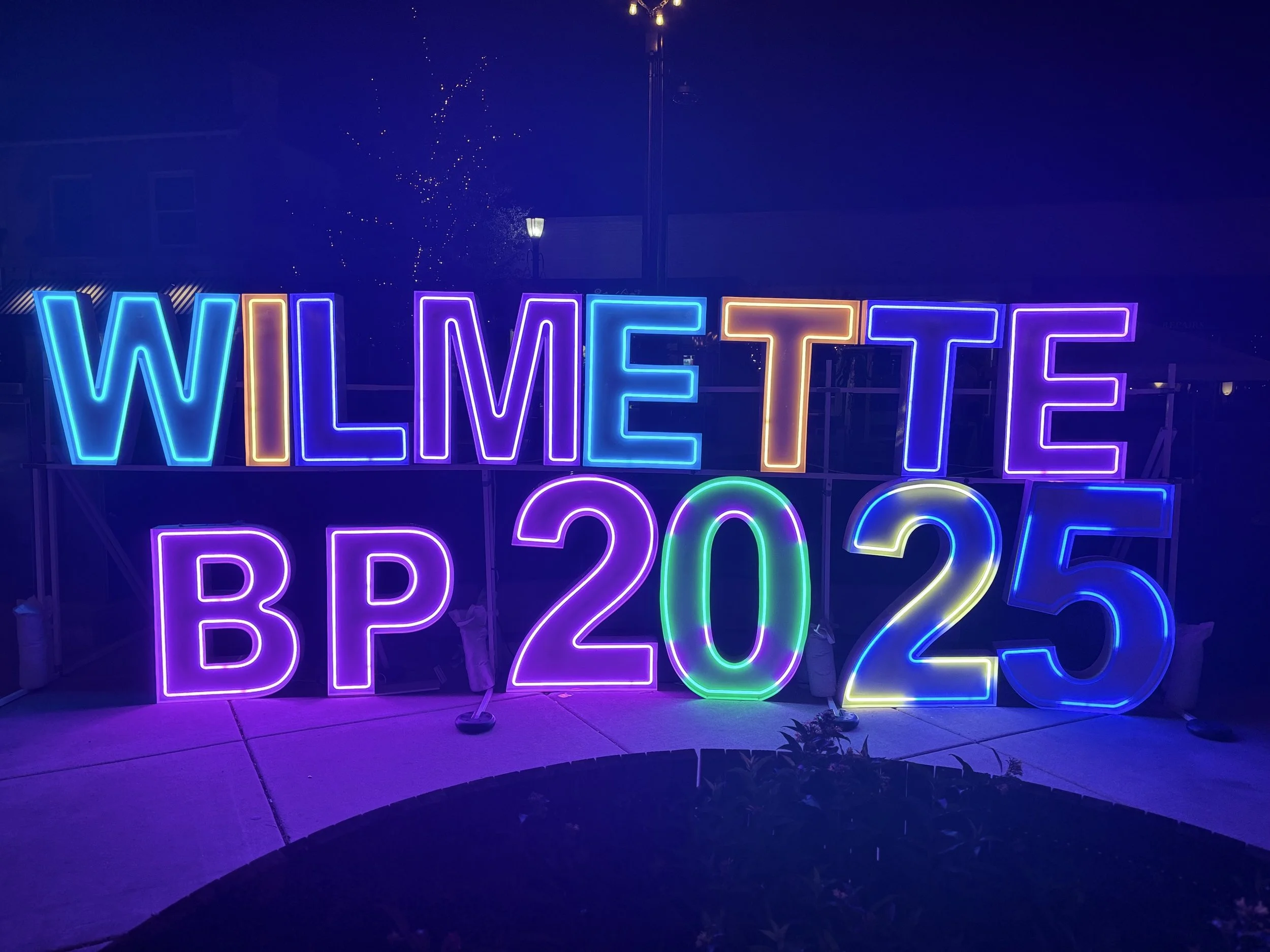 Colorful neon sign displaying 'WILM