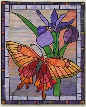 Bayou Butterfly--
Original design.
Made using fusible bias tape for stained glass effect.
Machine quilted on a domestic machine.
NFS