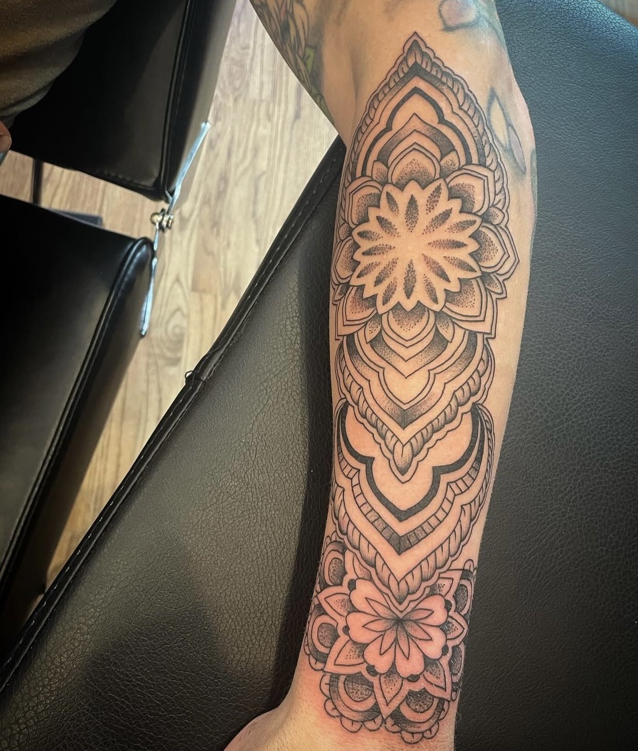 mandala and decorative tribal designs on forearm black tattoo Jocelyn Groff