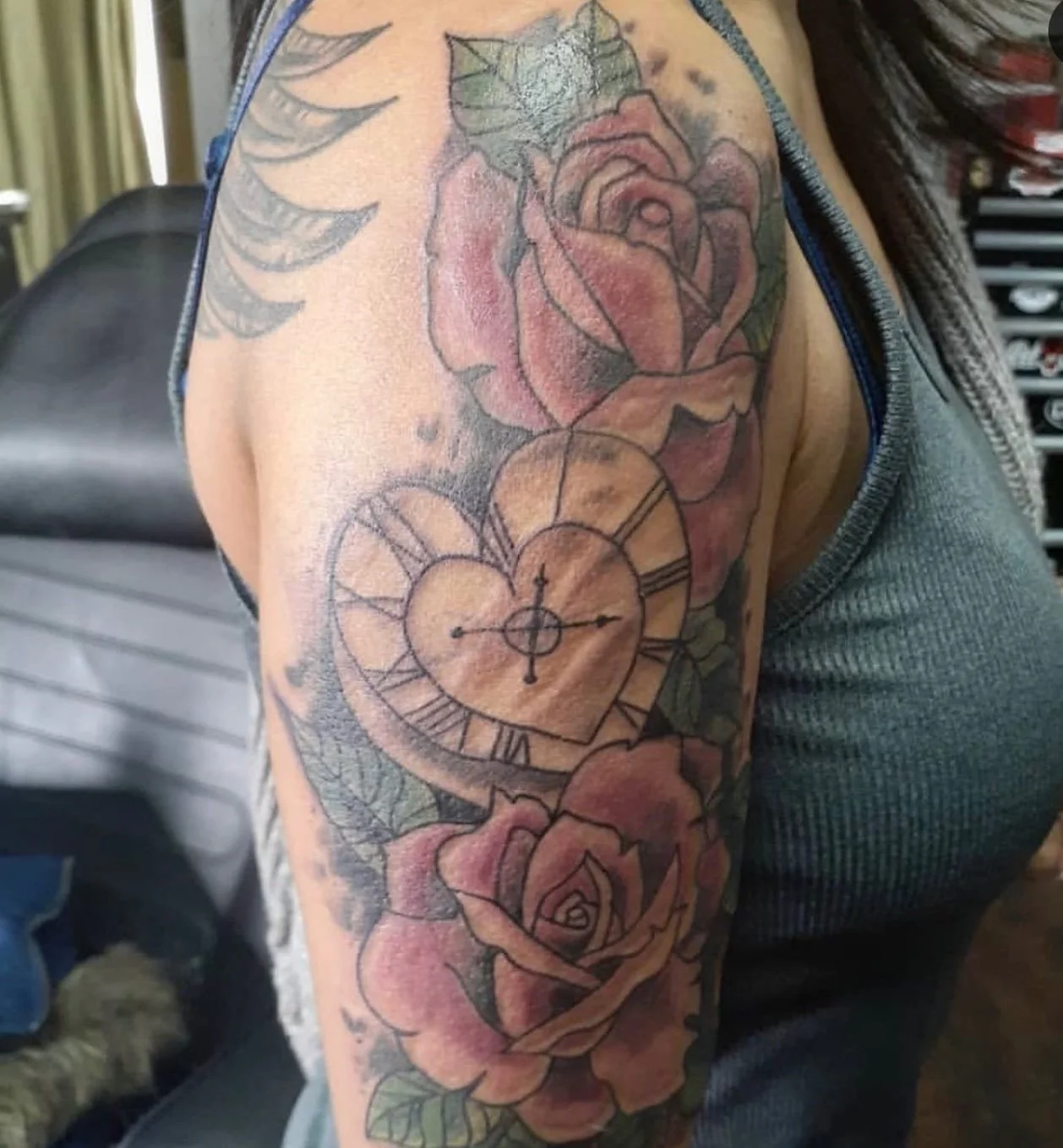female tattoo artist near me Albany New York NY roses and clock tattoo