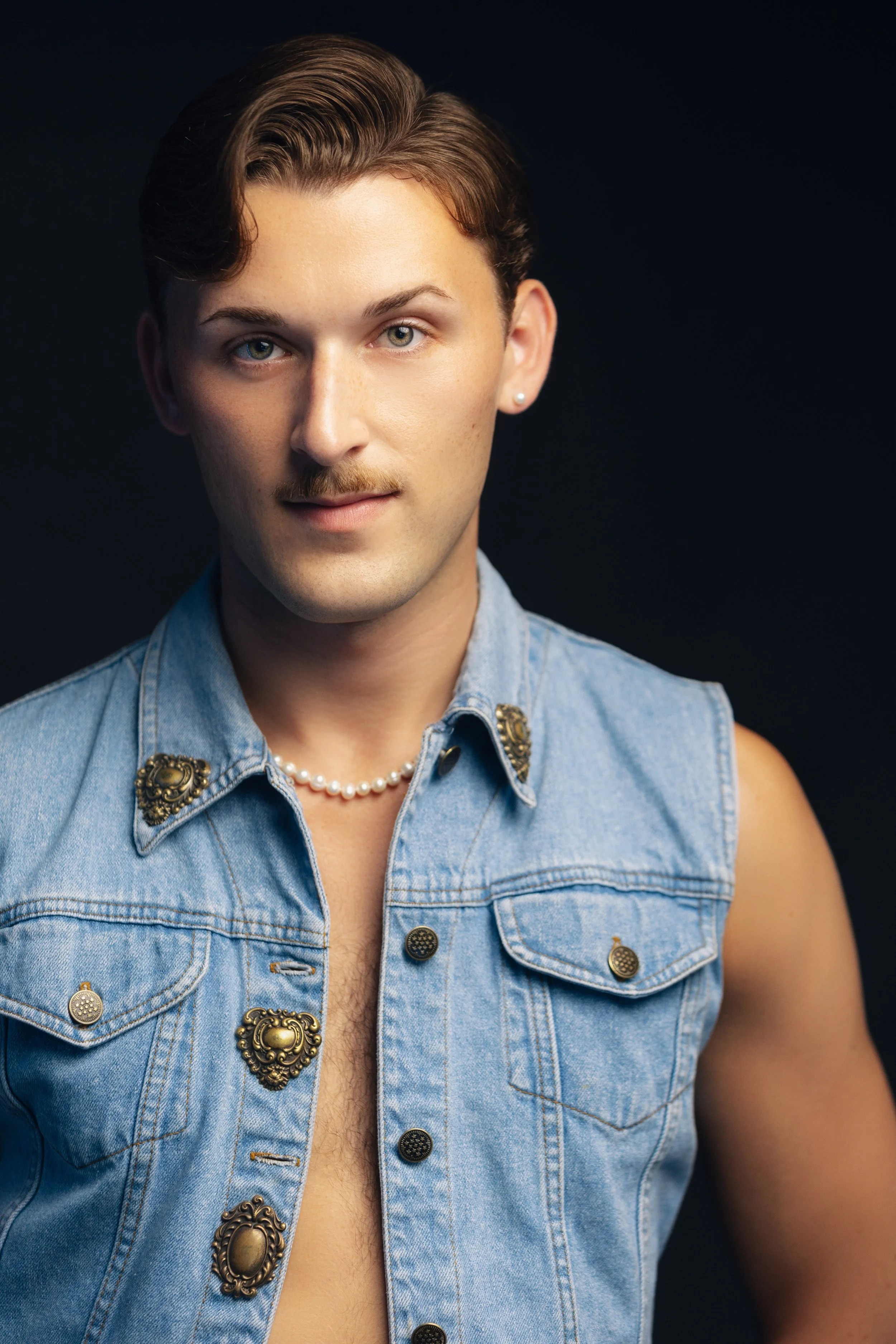 Justin Autz as Frank n Furter