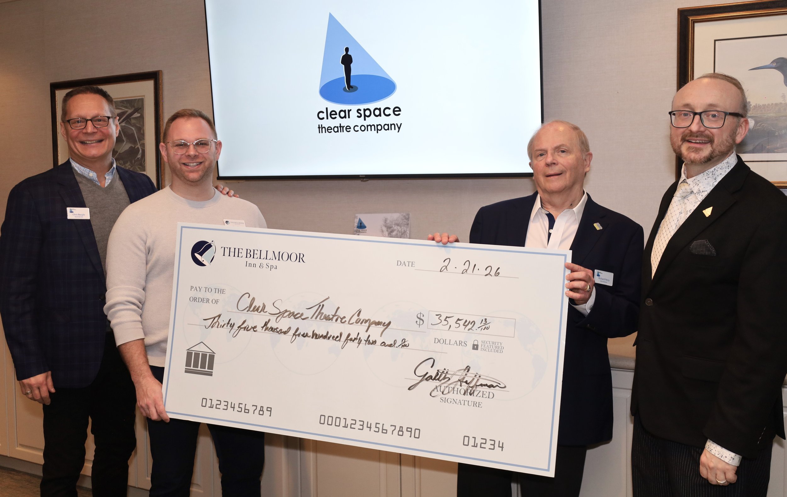 The Bellmoor Inn & Spa General Manager Garth Huffman presents a check to Capital Campaign Chair Rick Perry, flanked by Capital Campaign Vice Chair Chris Beagle and CSTC Managing Director Joe Gfaller. The generous donation makes the Bellmoor CSTC's la