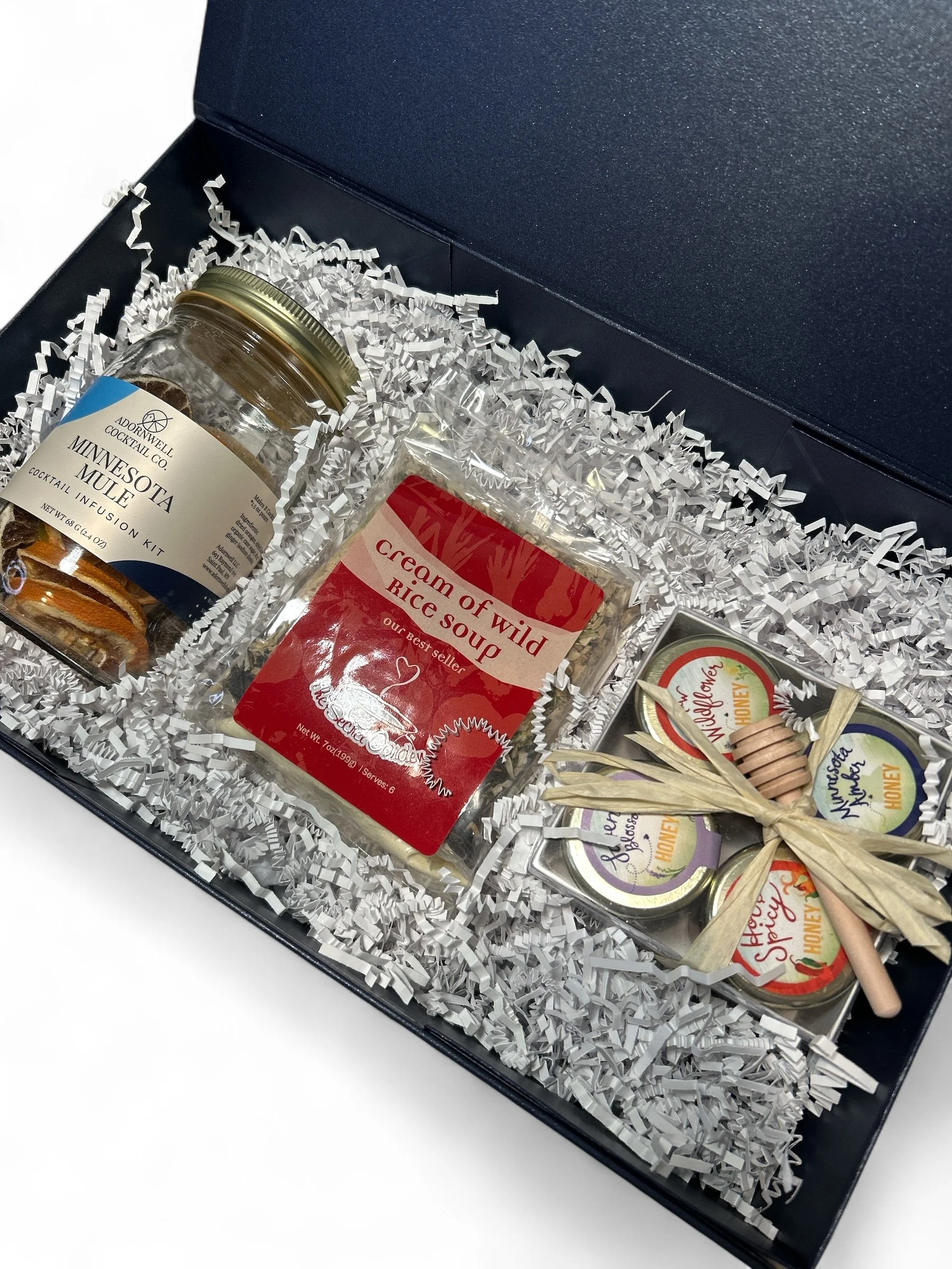 gift box with a cocktail kit, soup kit, and local Minnesota honey.