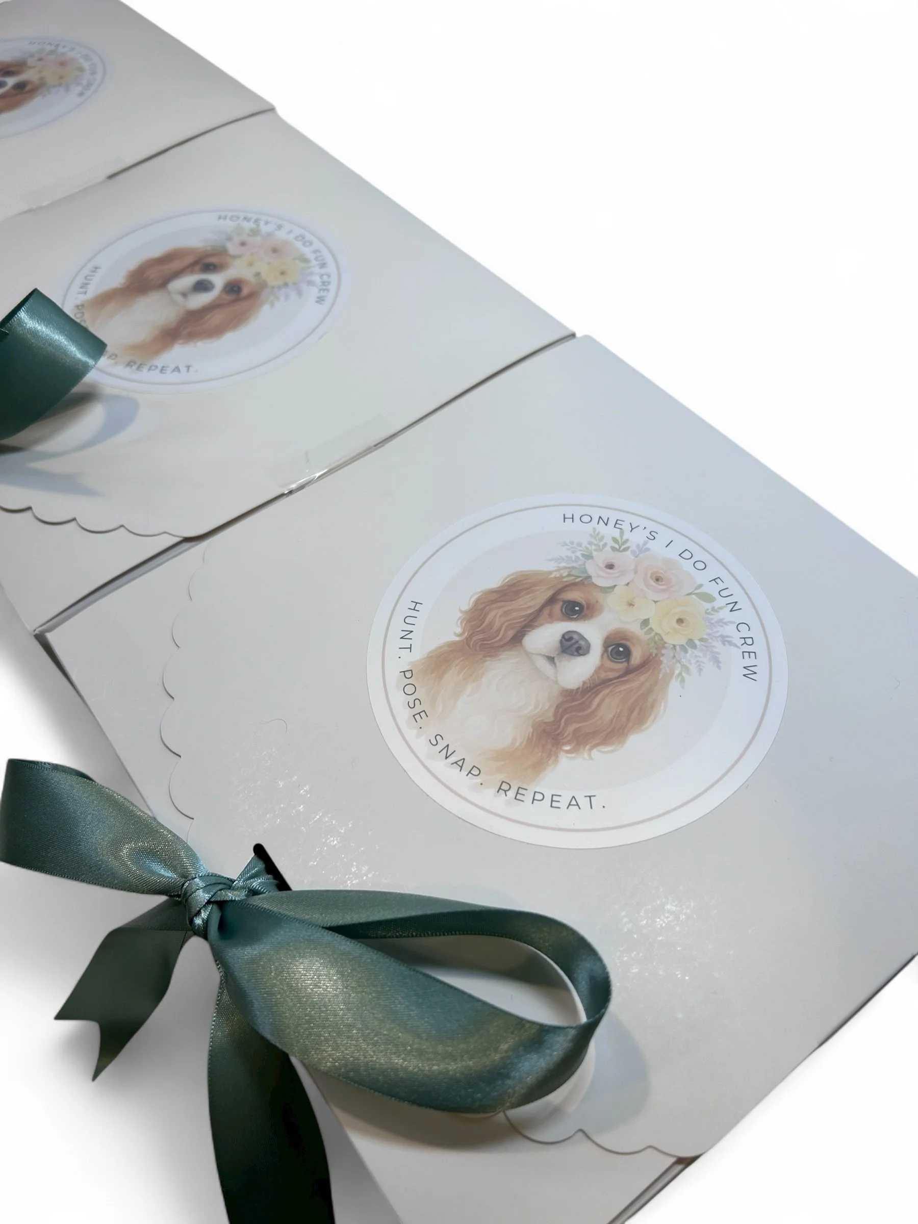 Gift Box with Custom Dog Sticker, Tied with Green Ribbon.