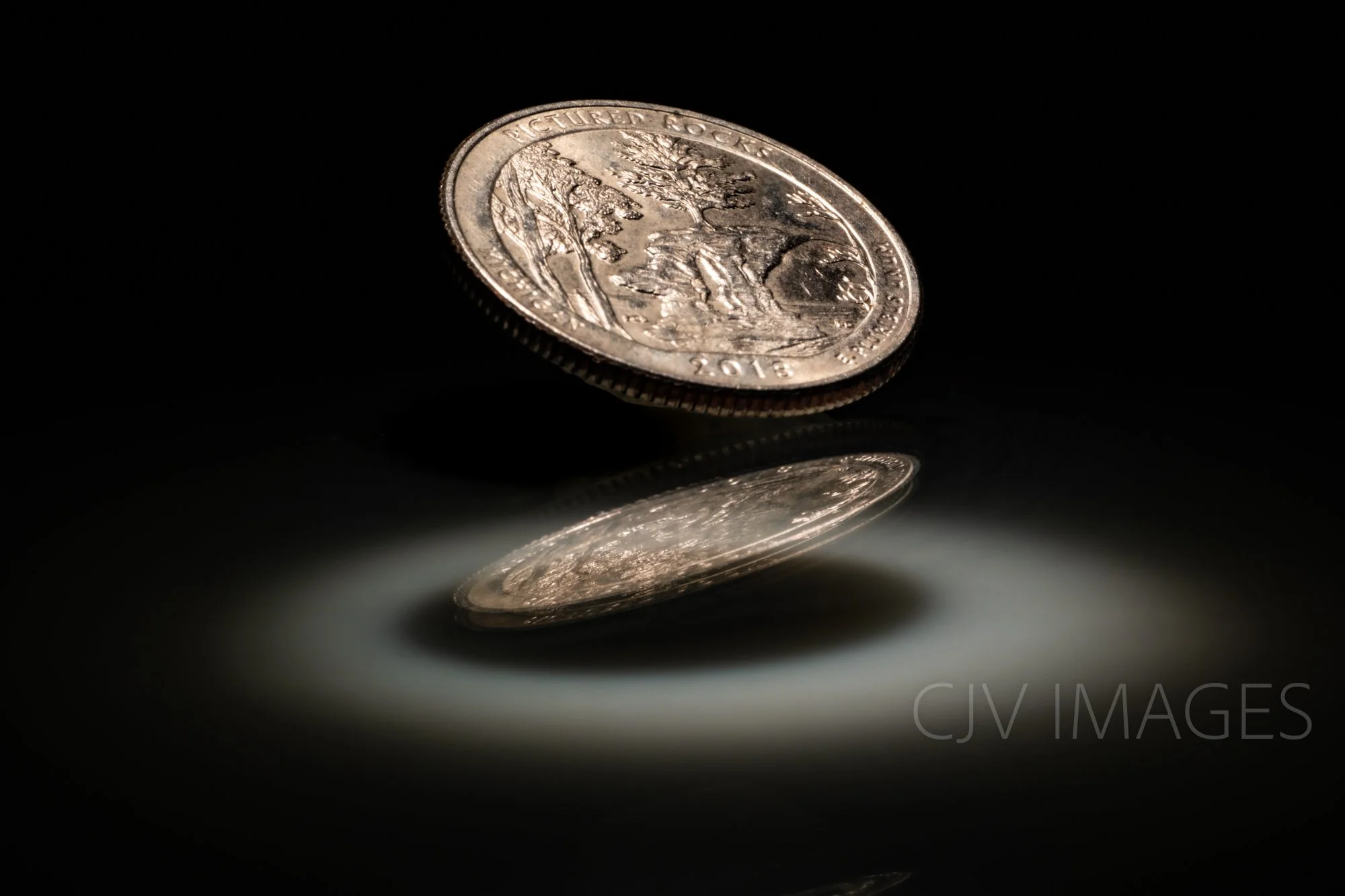 CURRENCY- STATE QUARTERS MICHIGAN  #2759 
*Michigan boasts a variety of notable features and contributions.
- Automotive Industry — Michigan is the birthplace of the American automobile industry, with Detroit being home to major manufacturers like Fo