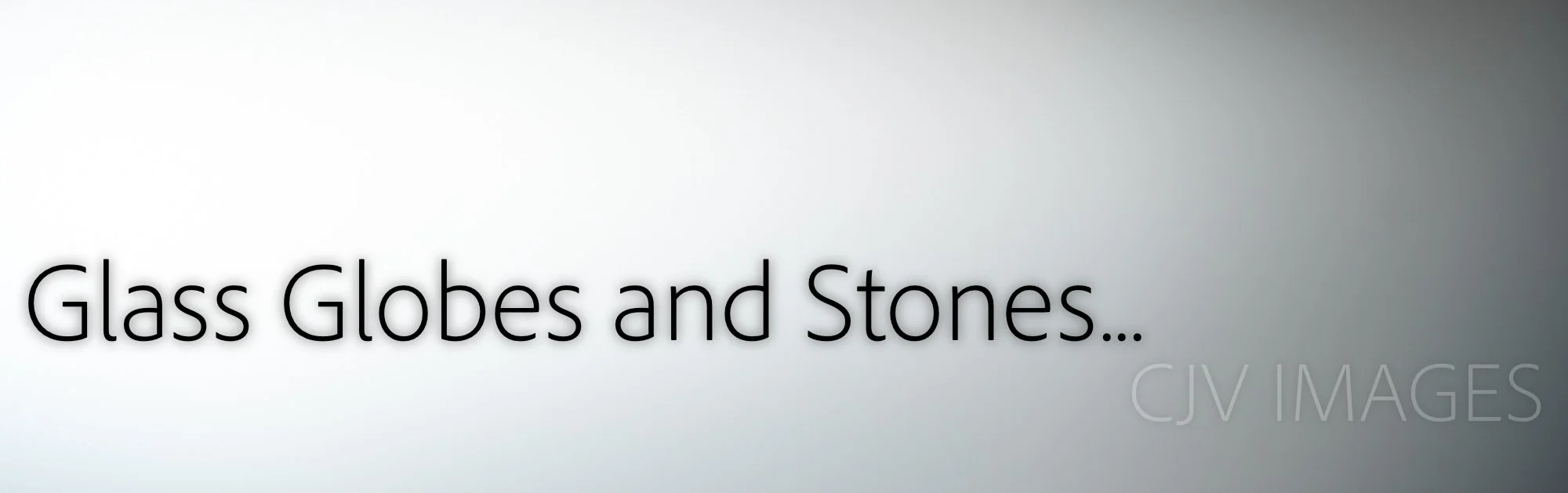 GLASS GALLERY- Glass Globes and Stones.JPG