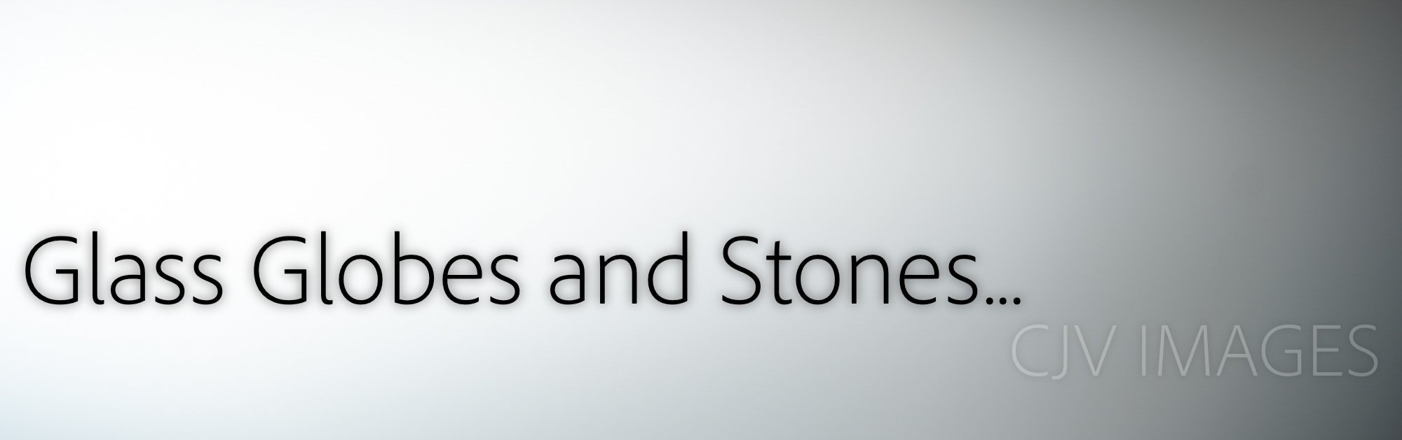 GLASS GALLERY- Glass Globes and Stones.JPG