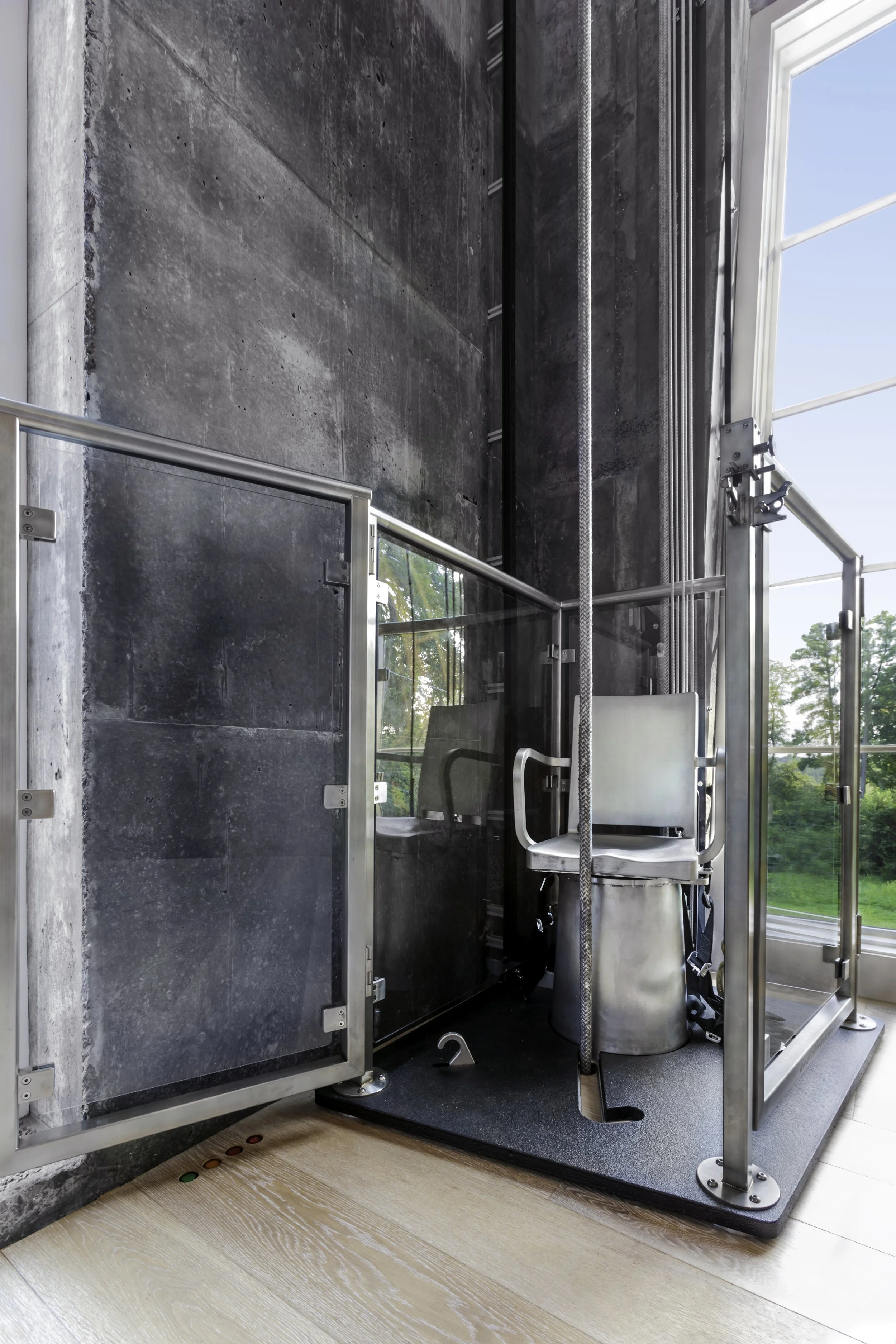 The wheelchair lift in the FANN house, a revolutionary project focusing on access for those mobility impaired, designed by McClennan Architects.
