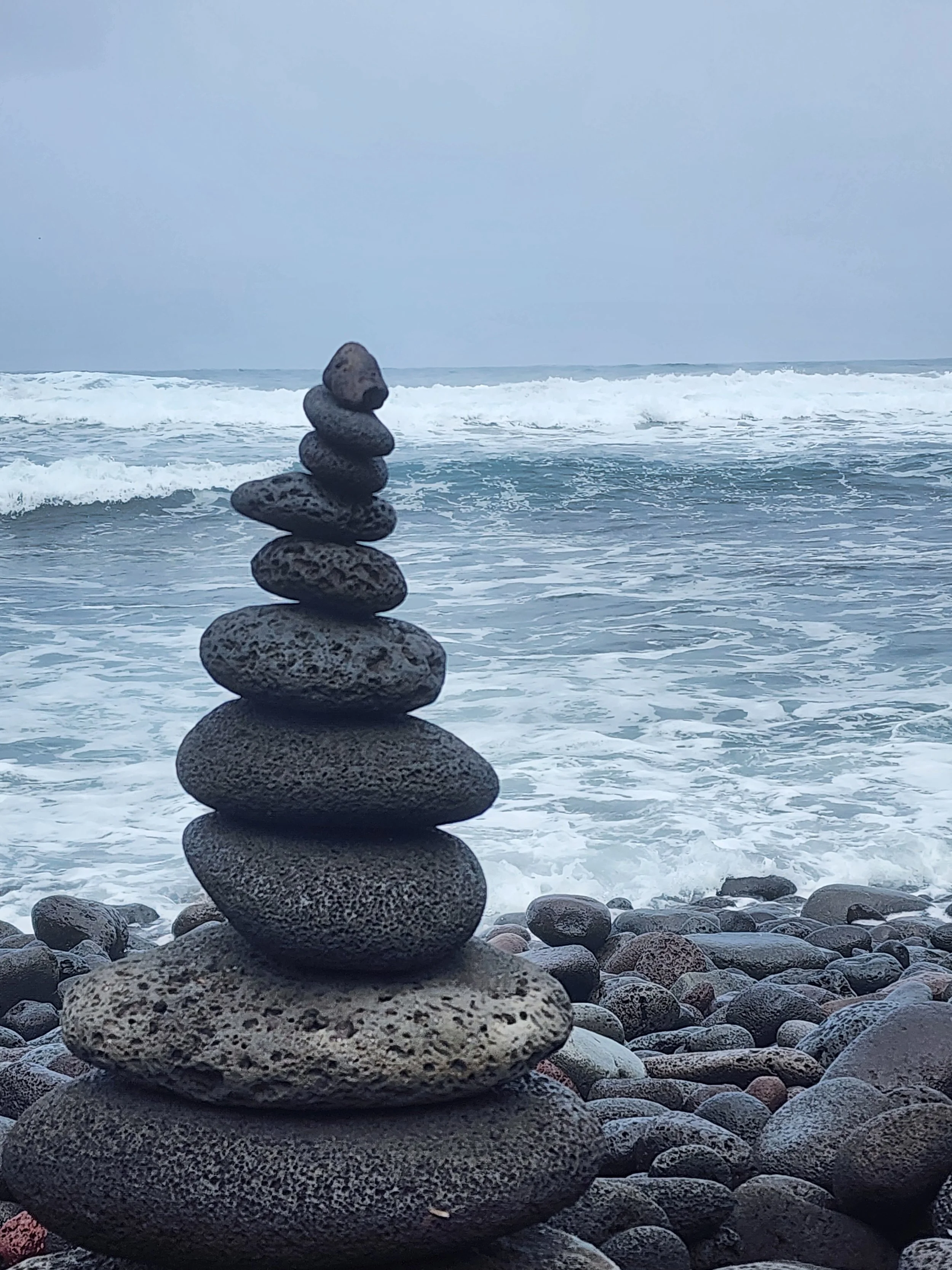 Cairn on the beach at Pololū Valley Lookout