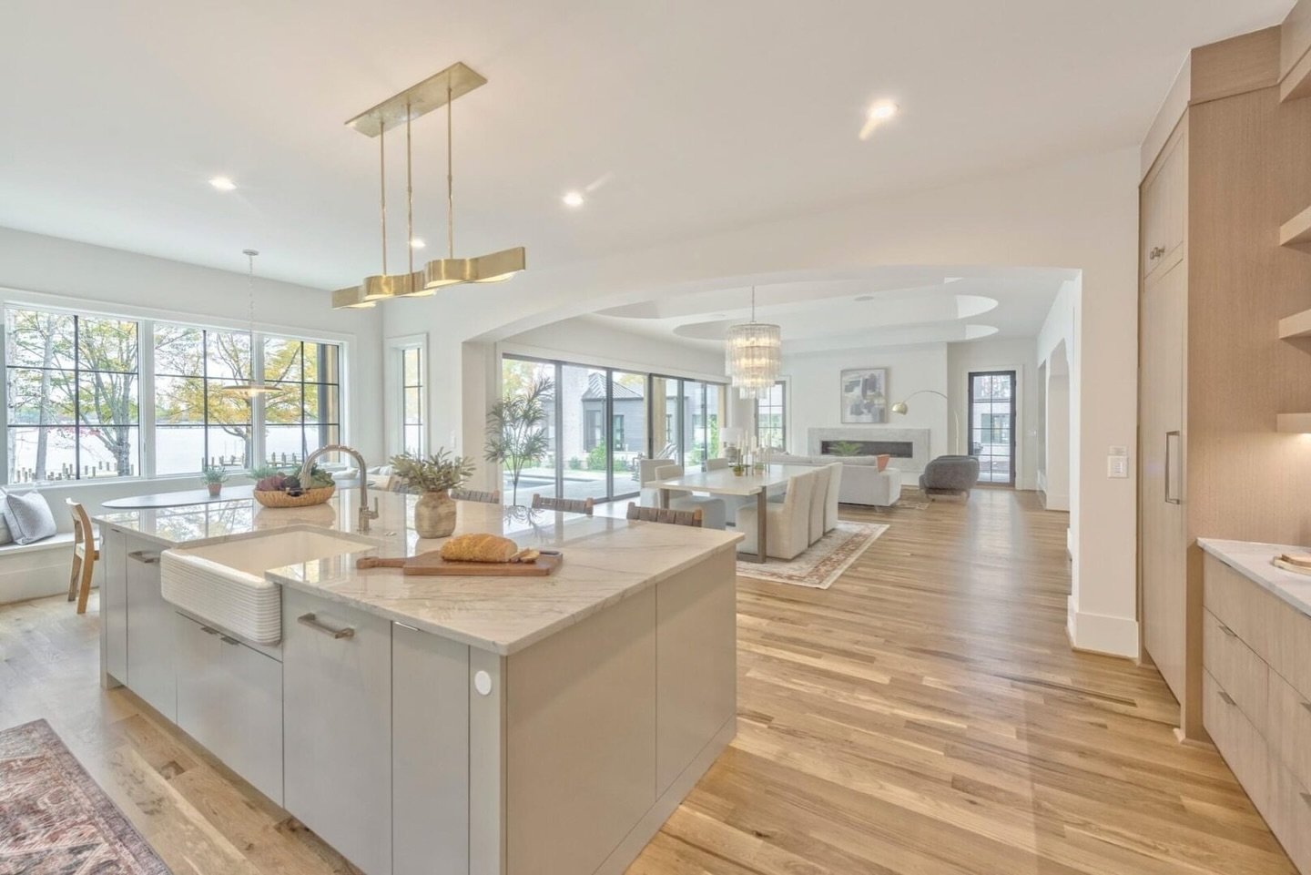 Where cooking meets cozy. 🤍 Welcome to this stunning open floor kitchen, dining, and living room, where every meal is seasoned with laughter and shared moments. 🍽️ #openfloorliving #homesweethome #kitchendesign #cookingspace #kitchenideas #interior