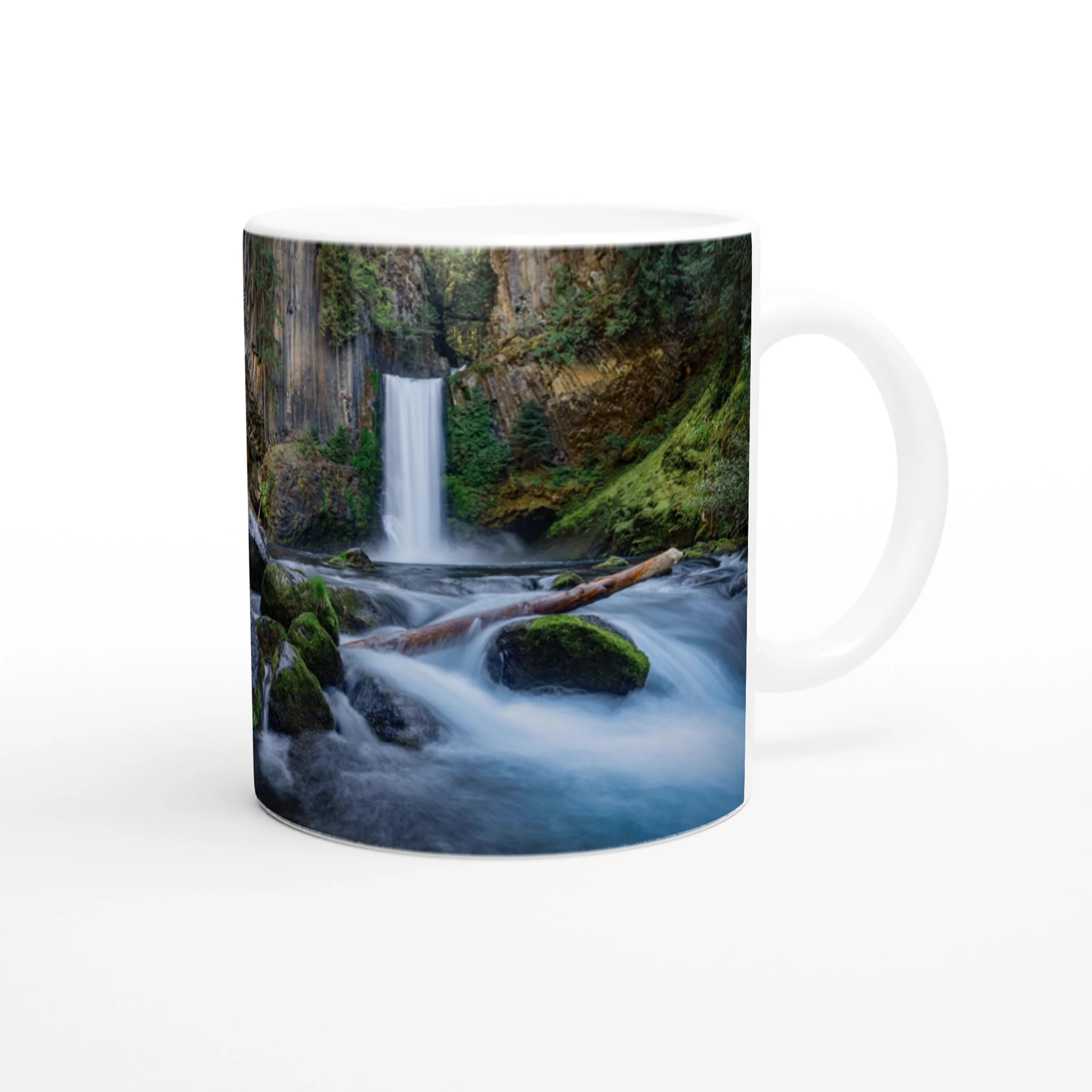 Waterfall photo side of the white Toketee Falls ceramic mug on a white background.